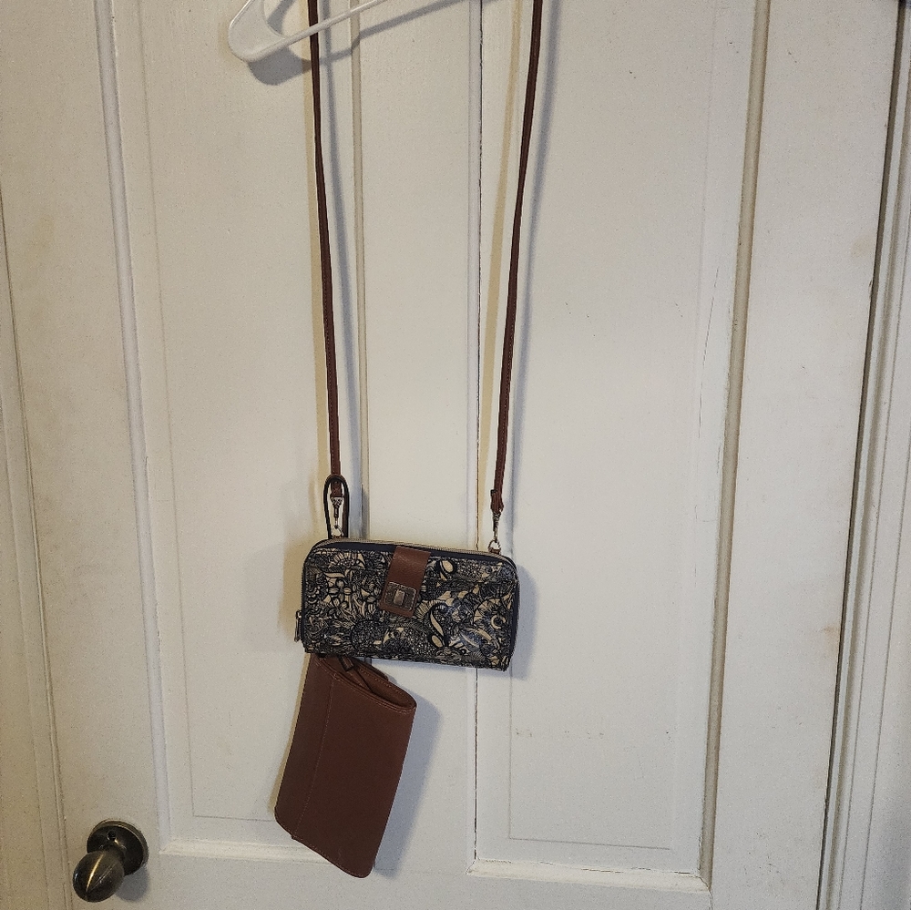 Two purses one strap